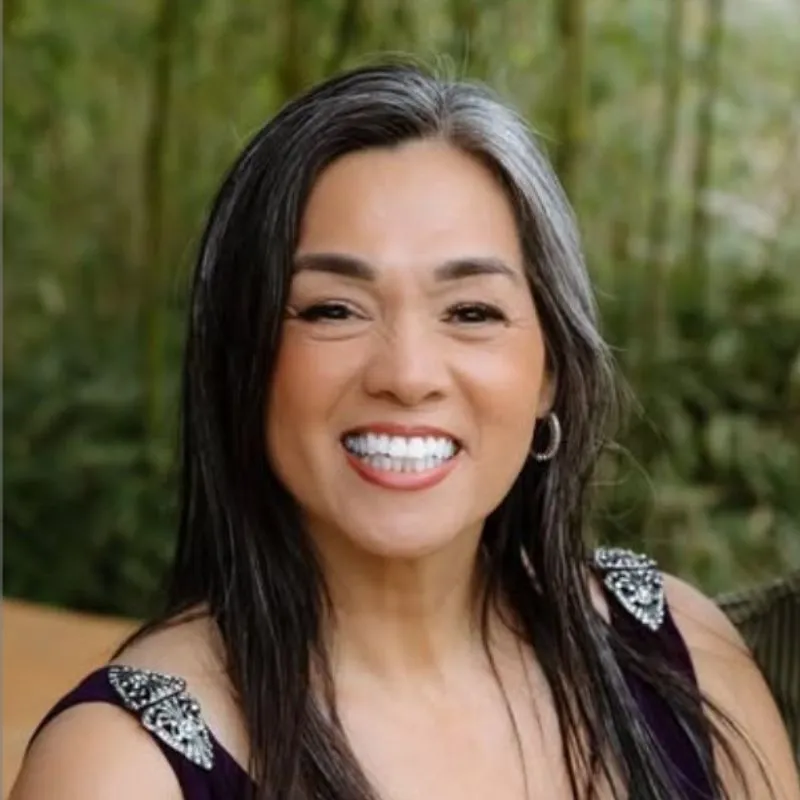 Genie Goodwin smiling, relationship coach