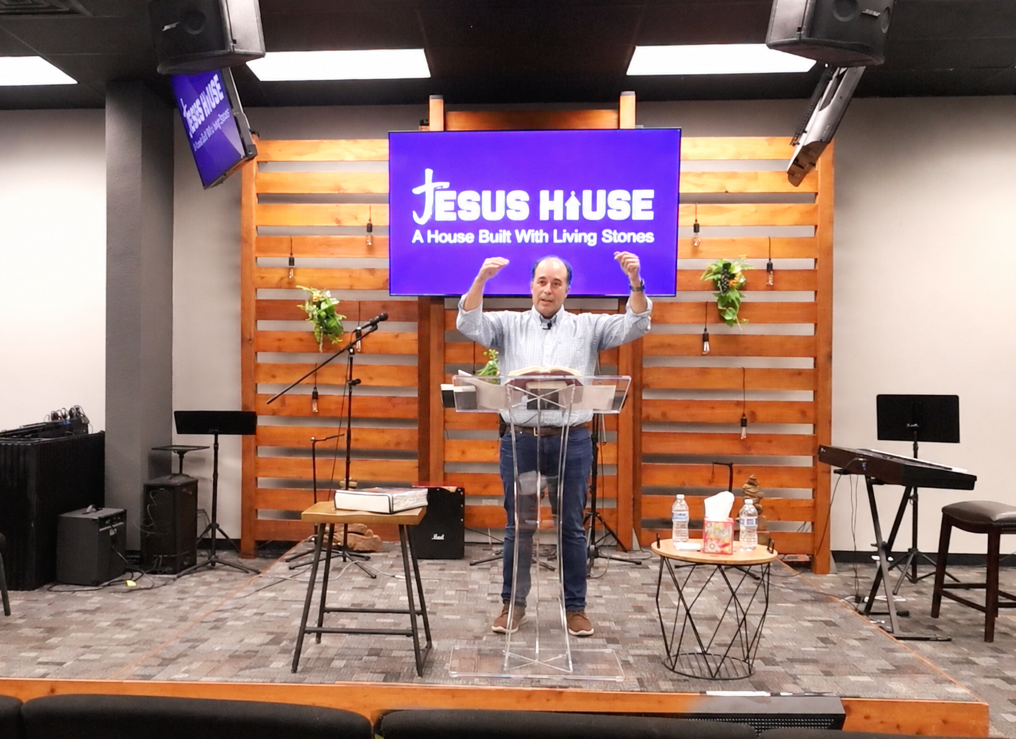 Ryan preaching and ministering at church service