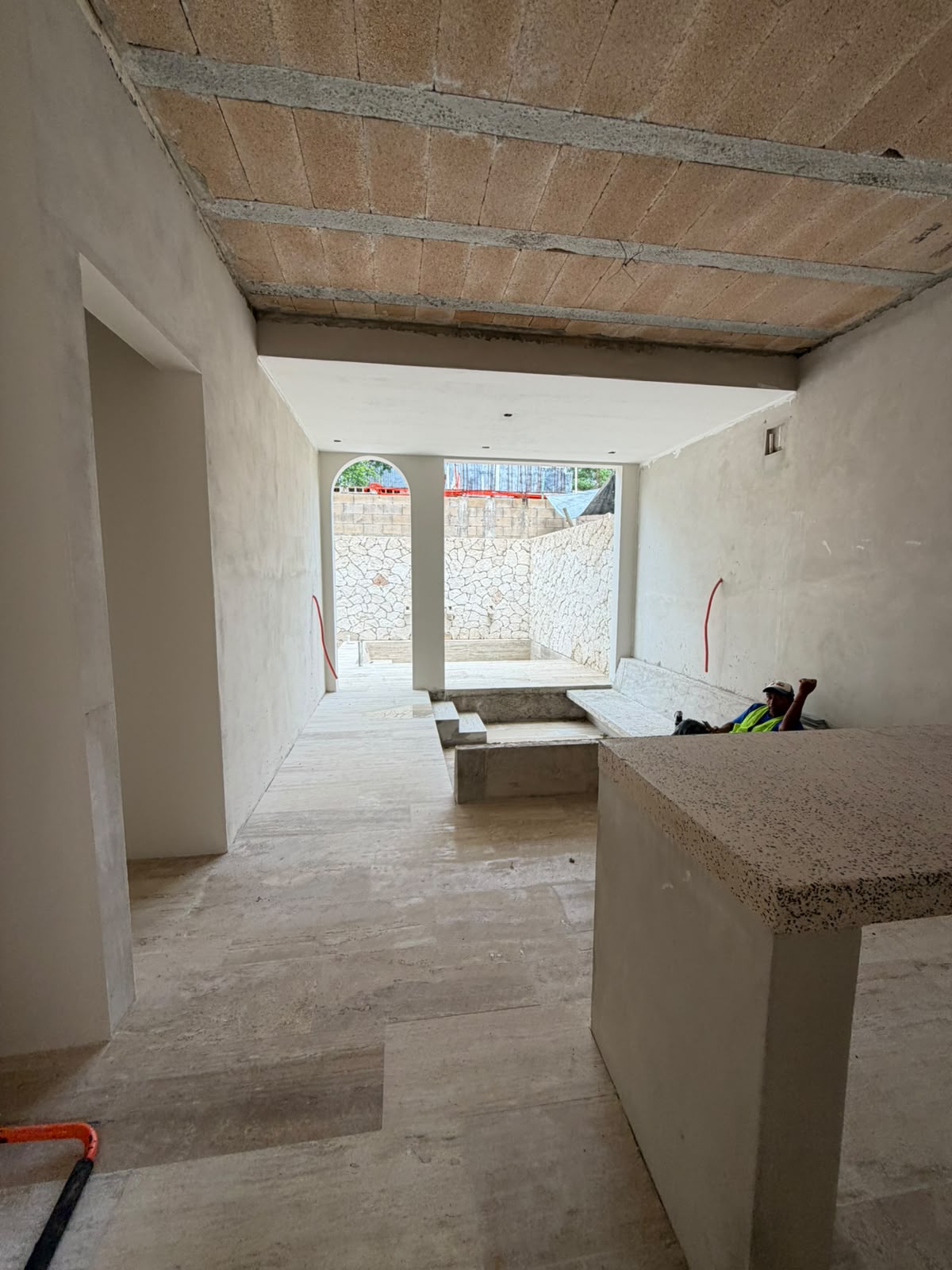 Residence ground level with terrazzo bar, sunken lounge and private stone courtyard