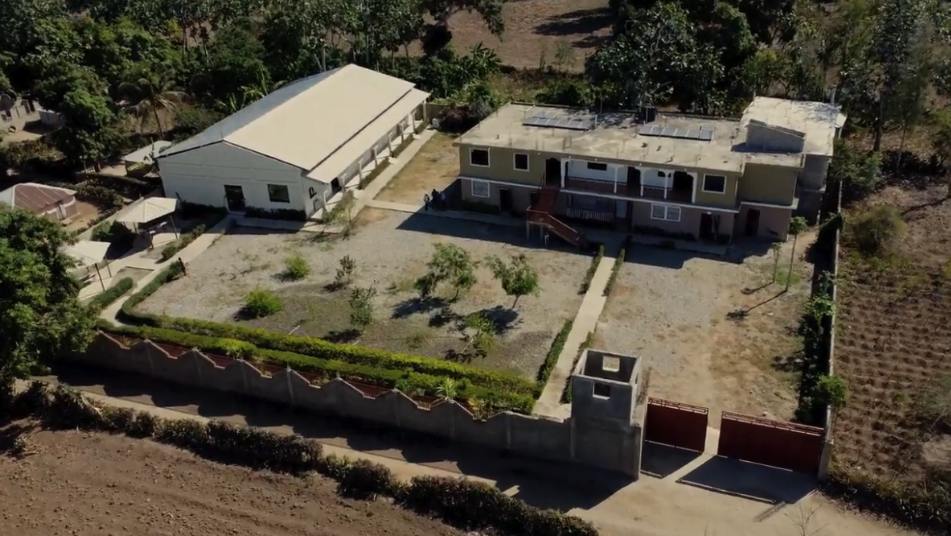 Aerial view of the Haiti seminary campus, buildings, and community grounds where Brian led ministry since 2007