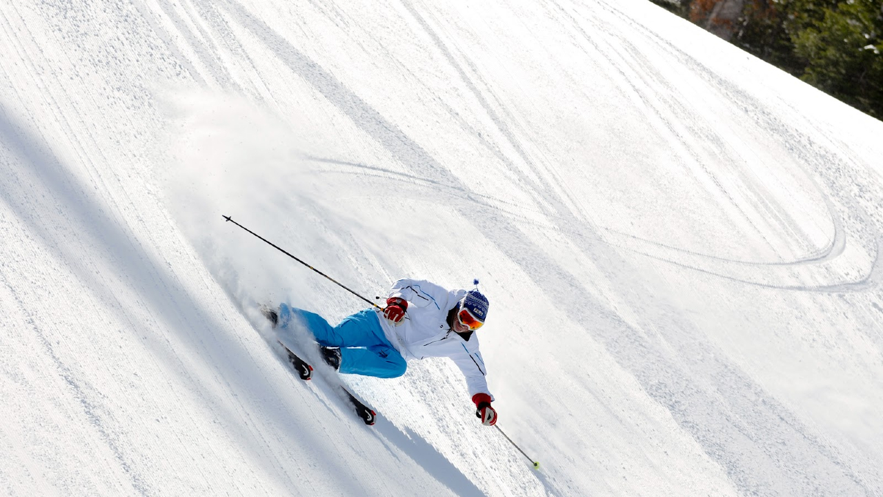 Harald Harb carving dynamic high-angle turns down the fall line