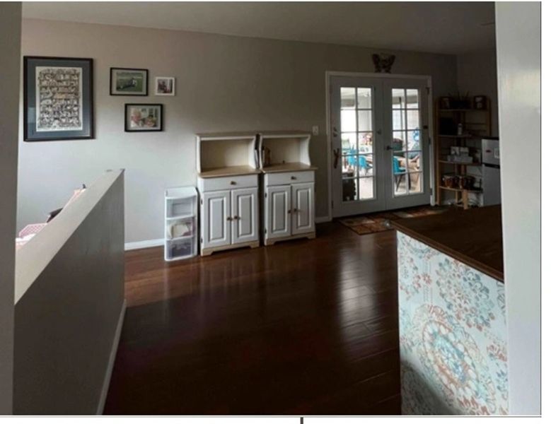 Before: an interior space with limited natural light