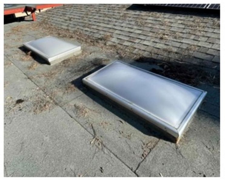 Before: an aging acrylic skylight in need of replacement