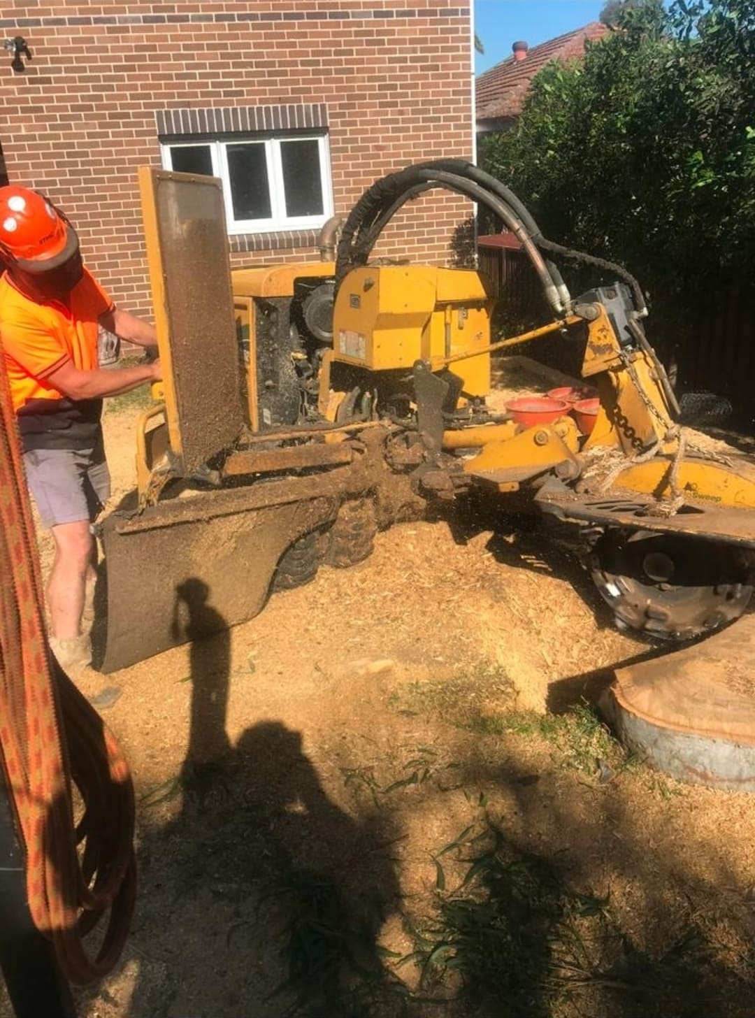 Stump grinding machine in operation by A1 Positive Arbor