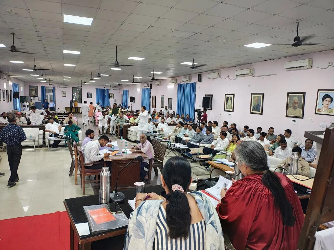 Administrative staff coordinating public information sign-off