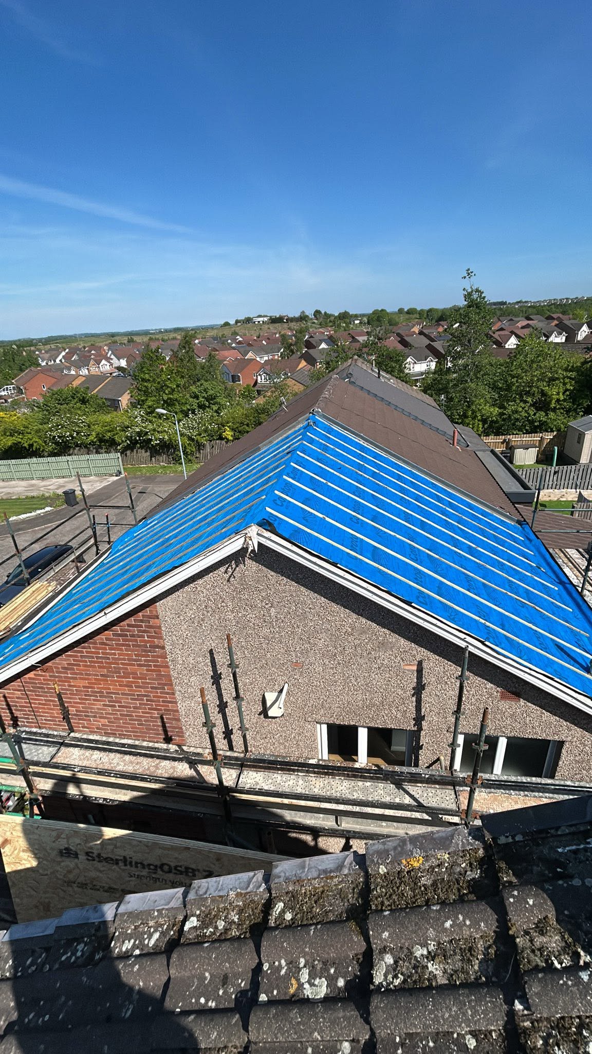 Complete roof rebuild with breathable weatherproof membrane, timber tiling battens and scaffolding by SJ Joinery & Building