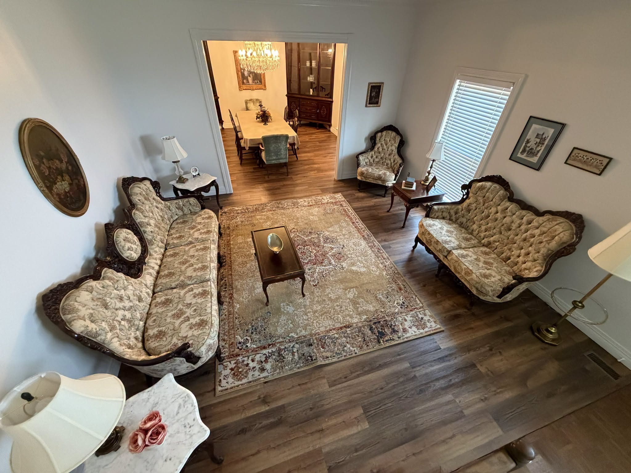 The Big House elegant antique living room and parlor looking into the formal dining room