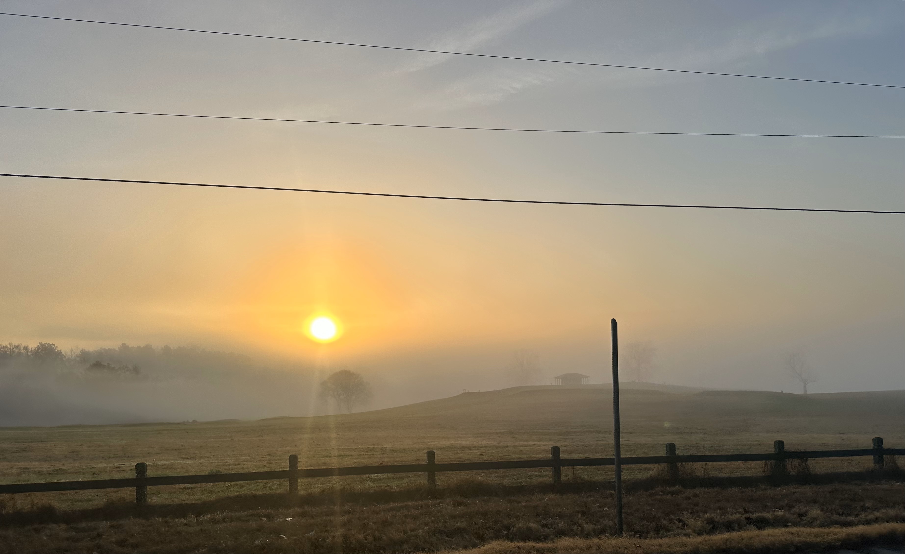 Morning sunrise over the rolling hills and property