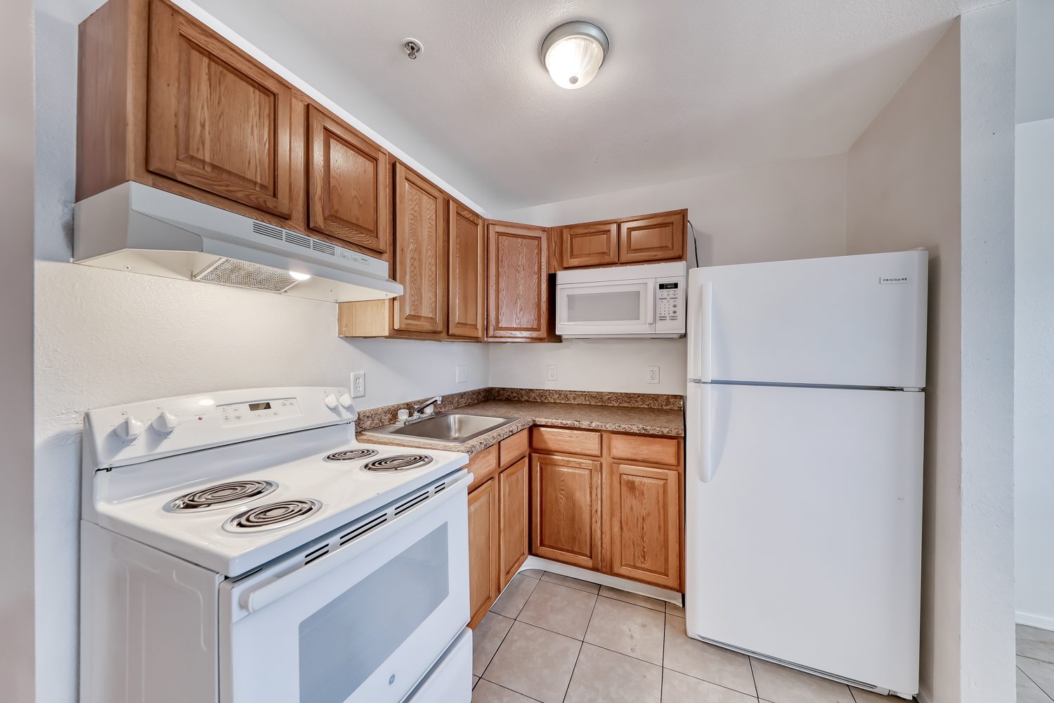 17_kitchen_cabinets_microwave_stove