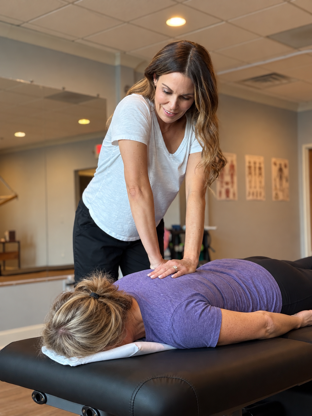 Dr. Teresa Dawson providing hands-on physical therapy care