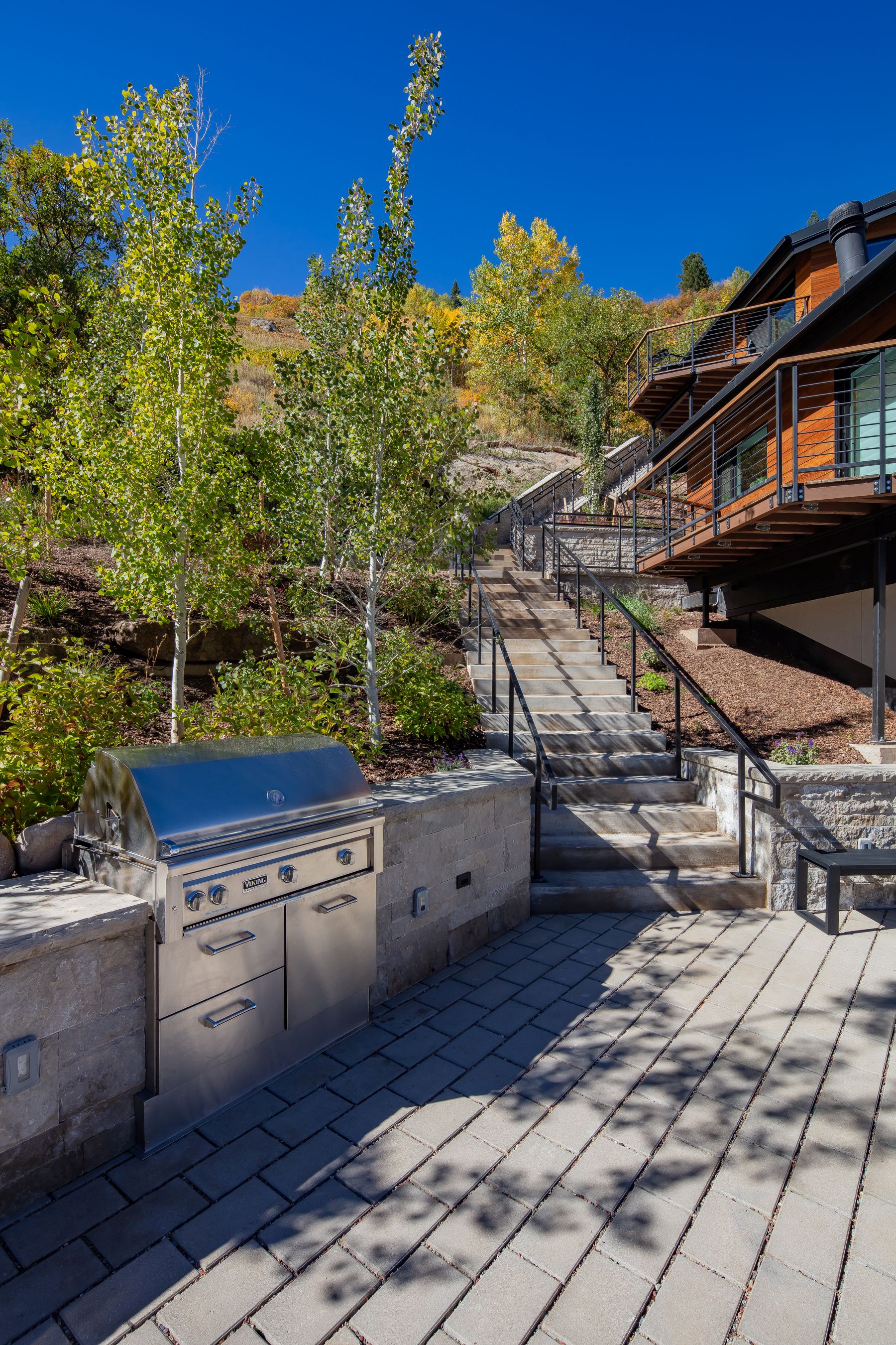 Hillside terrace & outdoor kitchen — Shadow Mountain Townhomes, Aspen, CO
