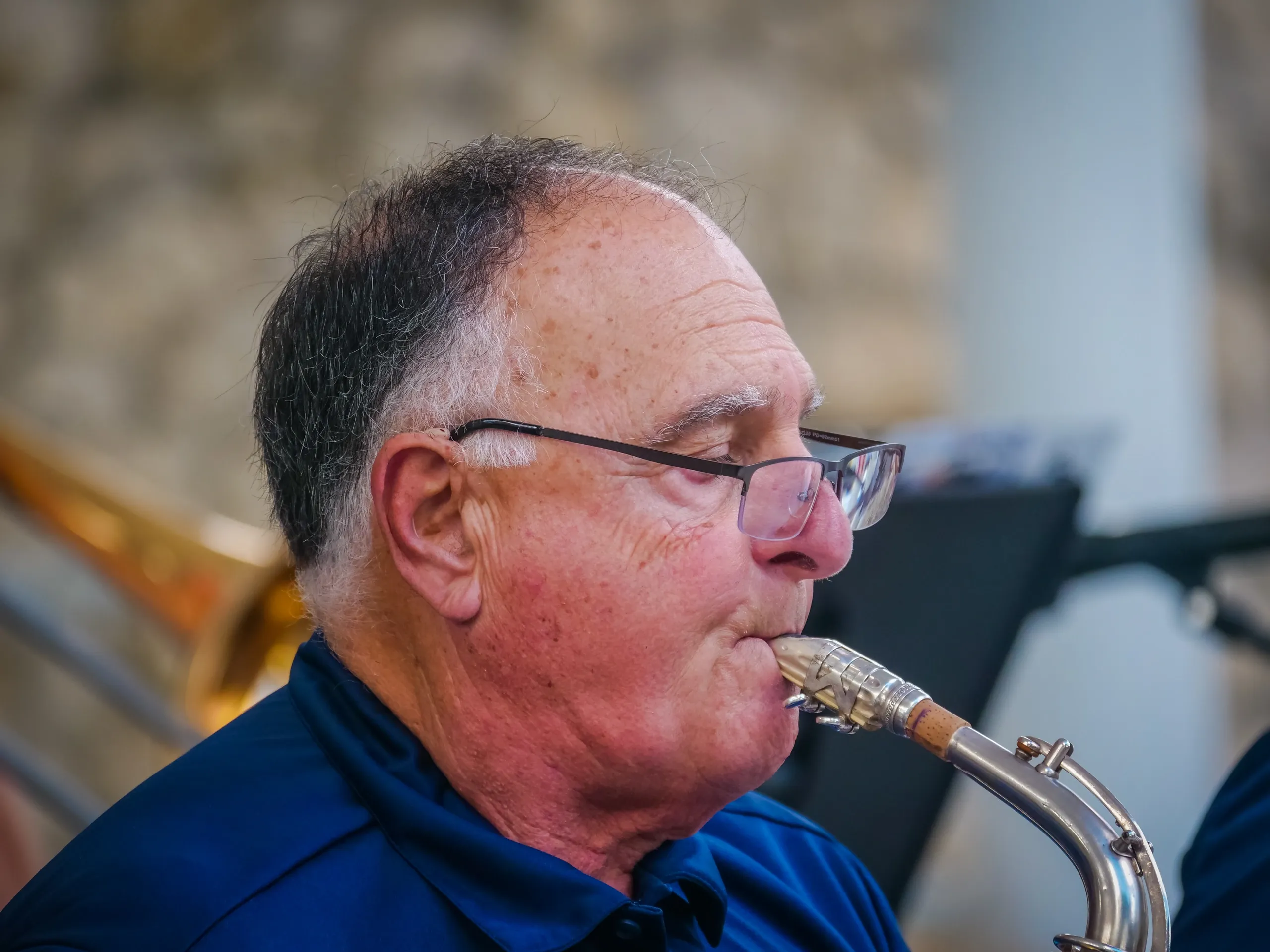 Tenor saxophone soloist performing with passion