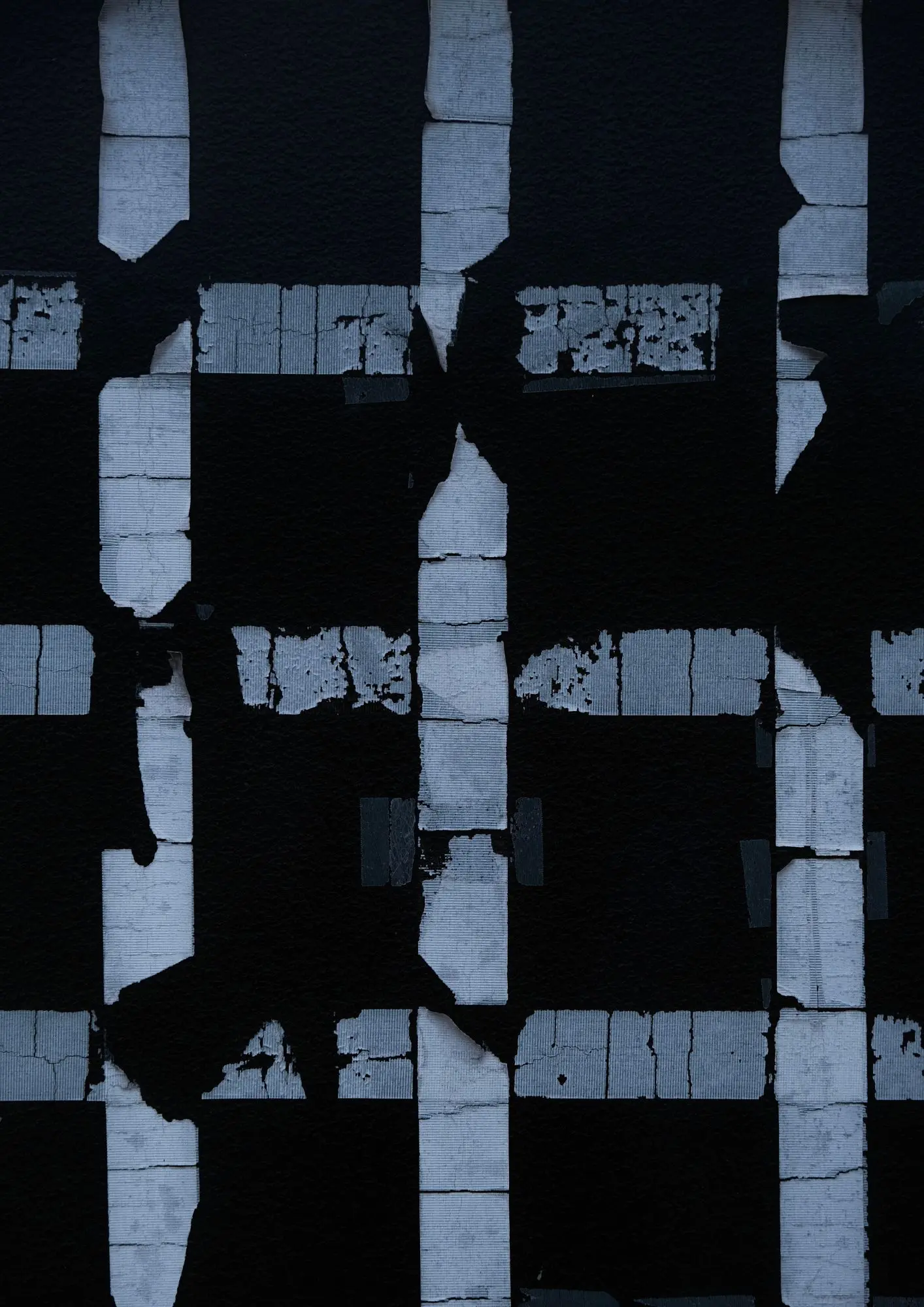 High-contrast architectural paper tape grid with peeled texture