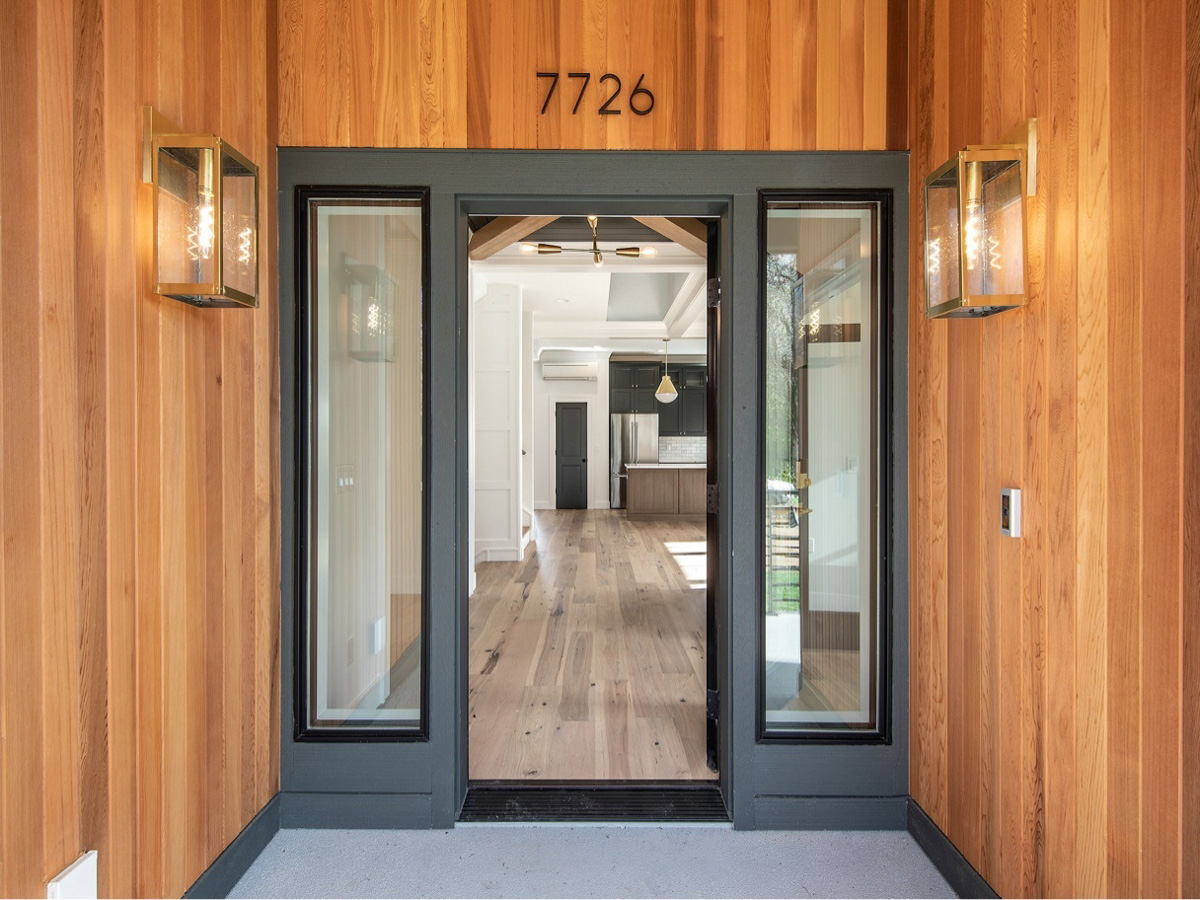 Cedar wood siding entry detail with house number 7726 on a modern Seattle WA home by Best Quality