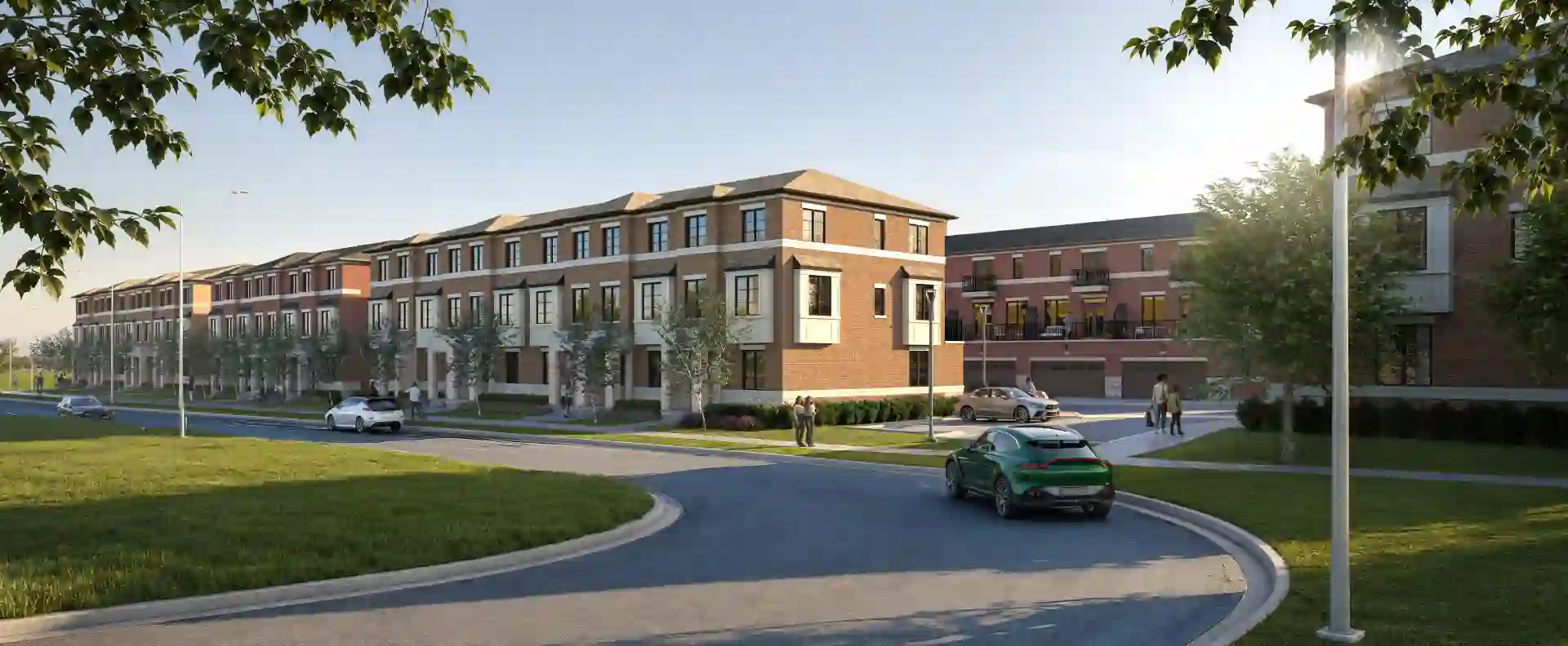 Elements Milton community streetscape showing modern townhome street and landscaped sidewalks
