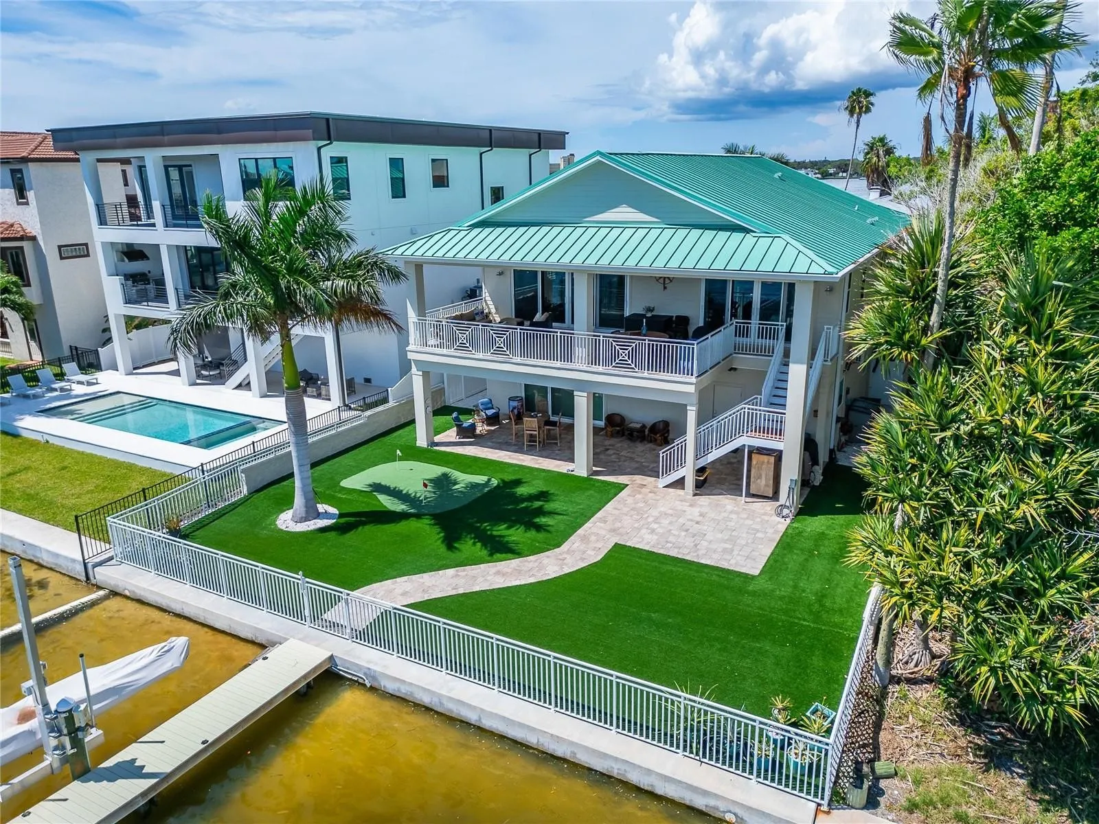 Canal-Front Covered Lanai & Putting Green — Custom Home, Madeira Beach, FL