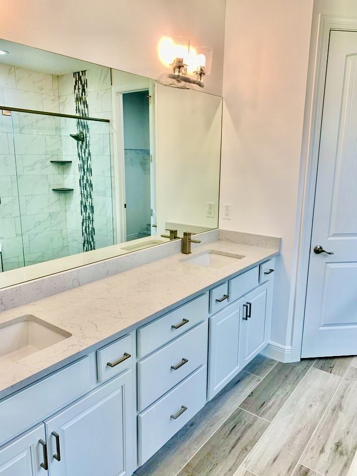 Dual Quartz Vanity with Brushed Brass Fixtures — Remodeling, Tampa Bay, FL