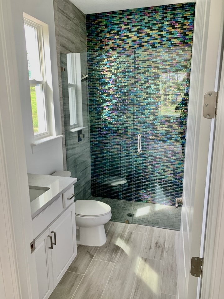 Iridescent Glass Mosaic Feature Shower & Modern Vanity — Remodeling, Tampa Bay, FL