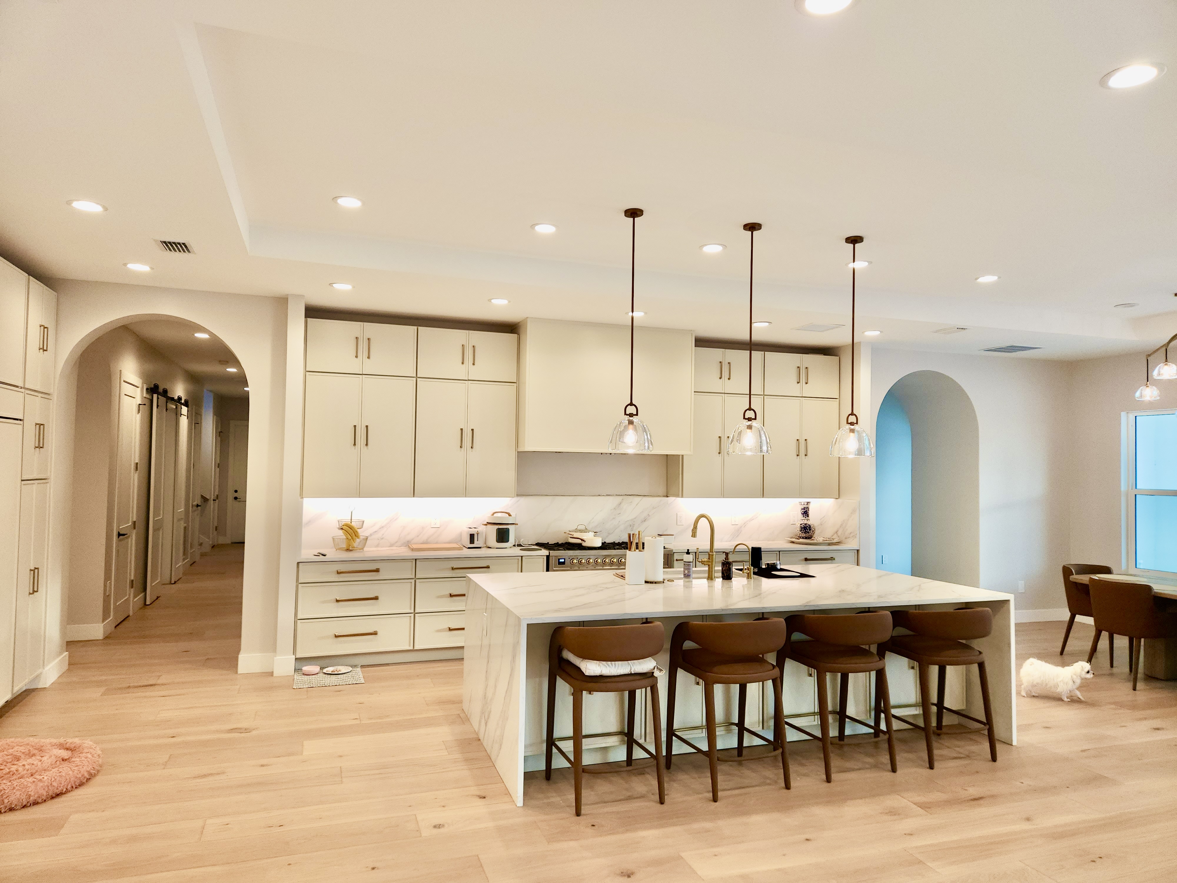 Double Waterfall Quartz Kitchen & Arched Entry — Custom Home, Tampa Bay, FL