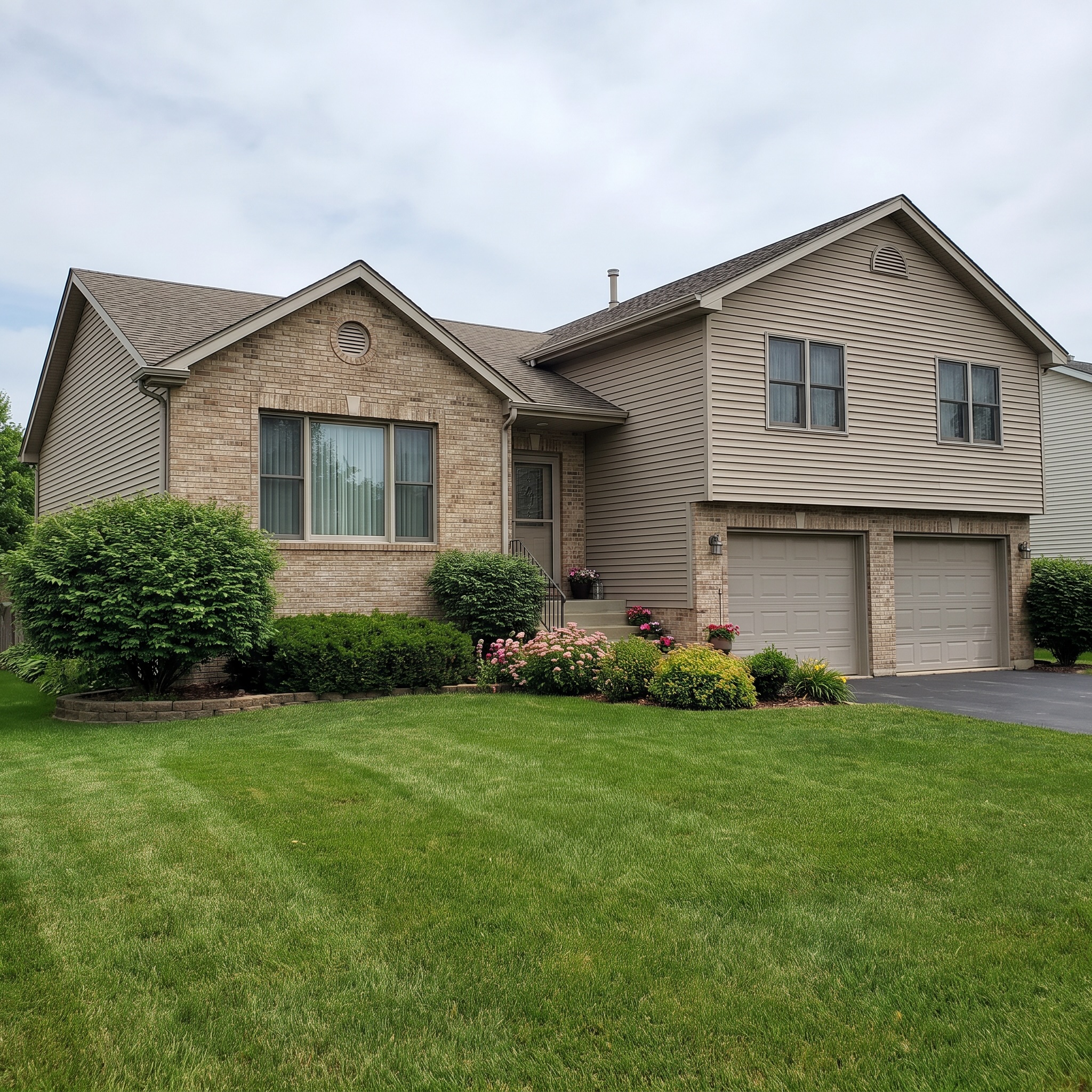 Split Level Lap Siding & Brick Pairing