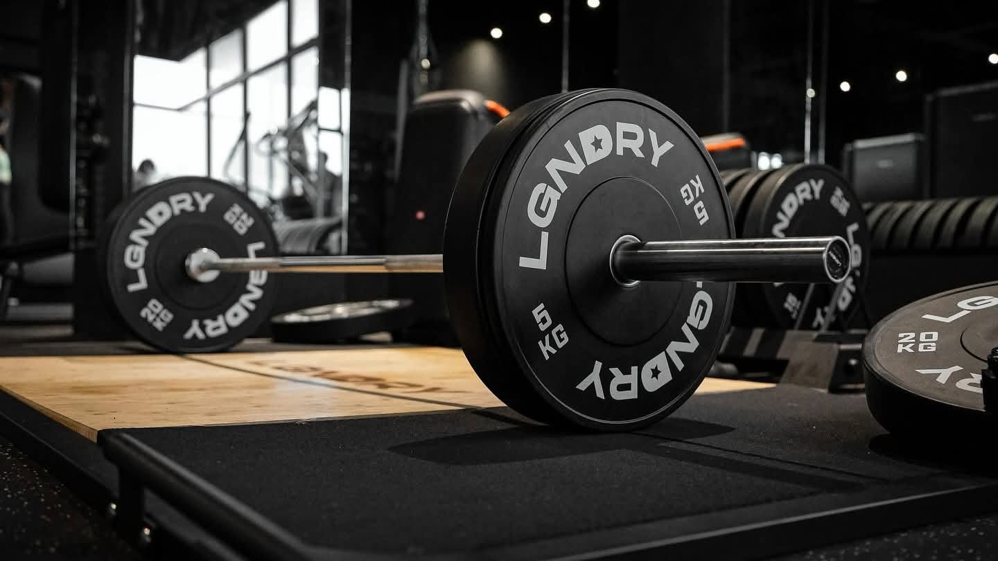 Olympic barbell and bumper plates on a deadlift platform at True Strength Fitness, Sta. Rita, Pampanga