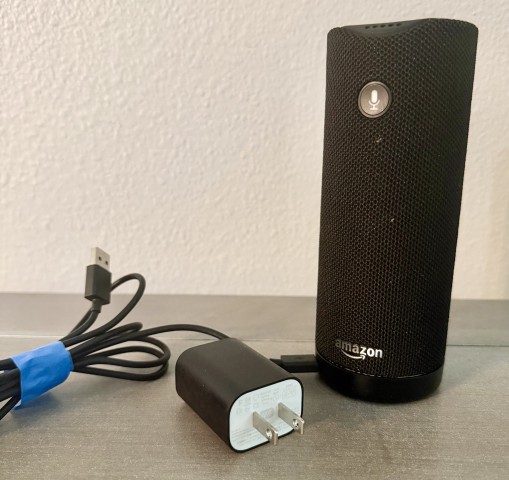 Amazon Tap portable Bluetooth smart speaker with power adapter and charging cable