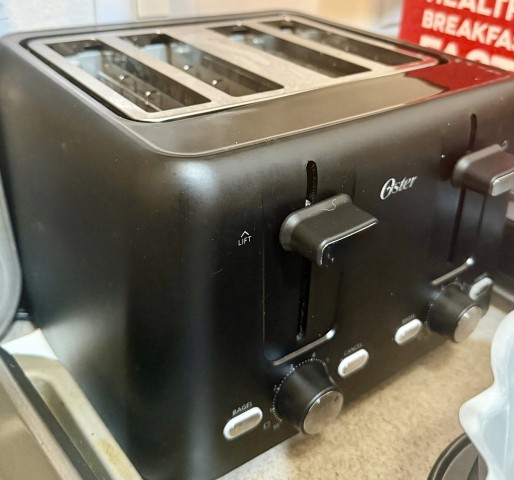 Oster four-slice black wide-slot countertop toaster