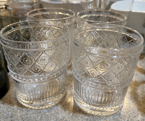 Set of vintage-style embossed pattern clear glass tumblers