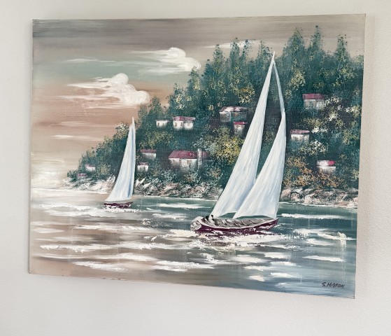 Coastal harbor oil painting with sailboats along forested village hillside