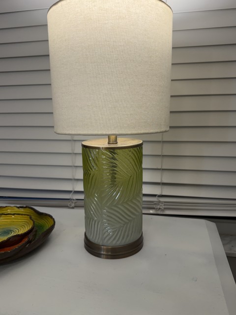 Textured green palm-leaf glass cylinder table lamp with linen shade