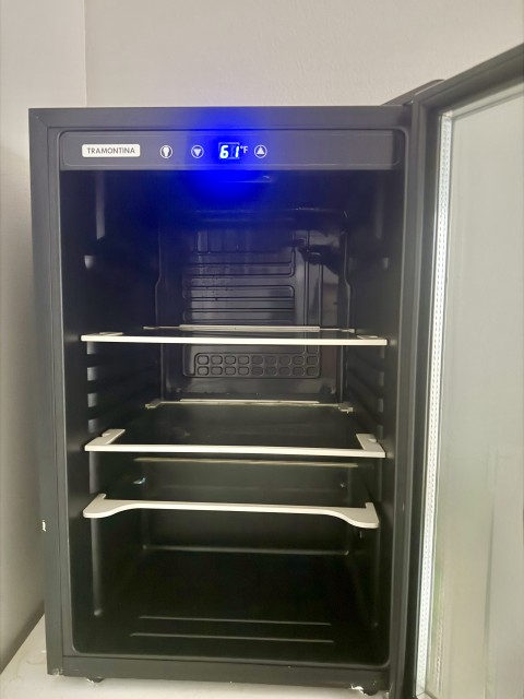 Tramontina compact glass-door beverage refrigerator with digital temperature display