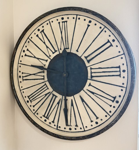 Large round vintage antique style wall clock with black Roman numerals