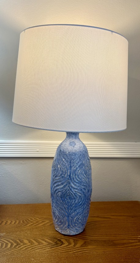 Blue and white textured ceramic bottle table lamp with white shade