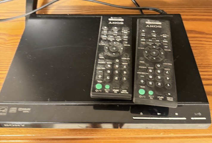 Sony DVD player with two Sony remote controls