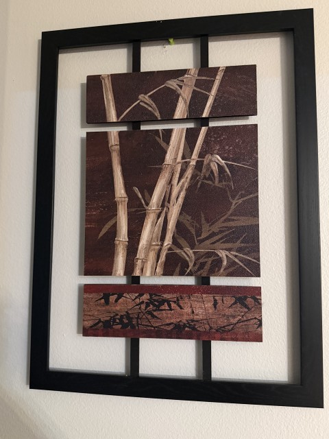 Framed bamboo botanical wall art with black modern frame
