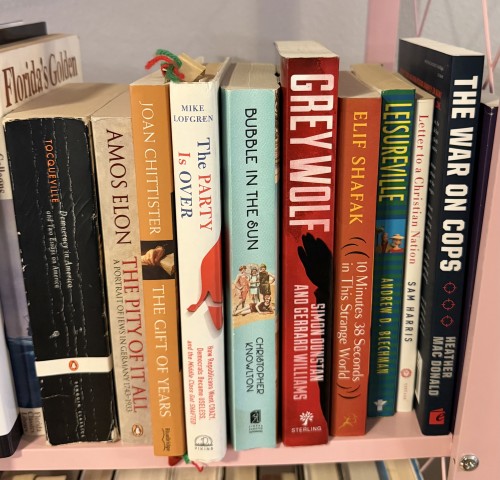 Collection of history, politics, and non-fiction books on a shelf