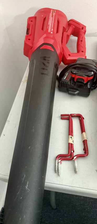 Craftsman cordless leaf blower with battery pack, charger, and hanging hooks