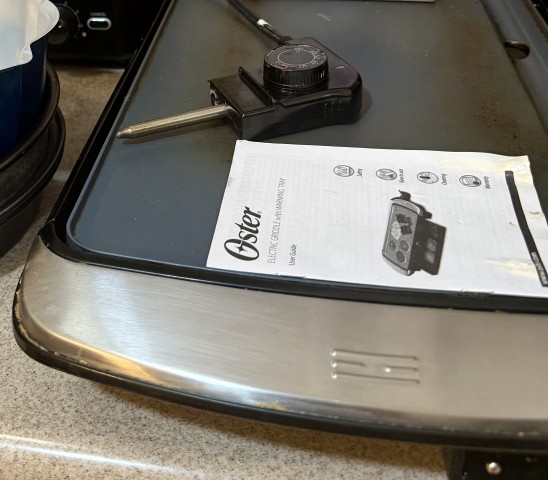 Oster electric countertop griddle with temperature probe and user guide