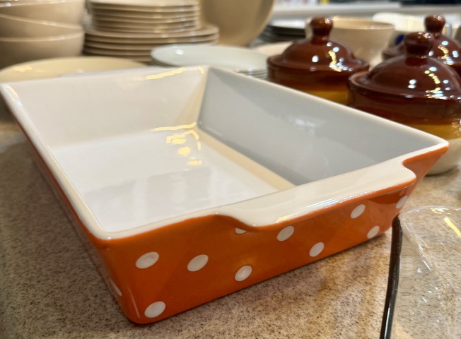 Orange and white polka dot ceramic rectangular baking dish