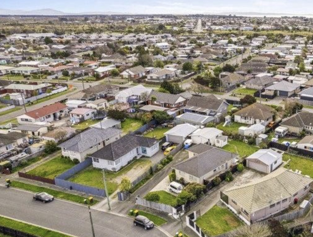 Aerial view over Aranui residential streets and sections