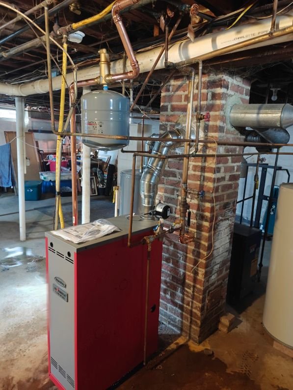 Residential gas furnace installed and serviced by Sutton Heating and Air