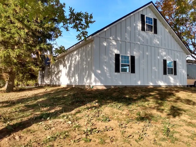 White board and batten residential custom build by Sunrise Builders 4 LLC in East Tennessee