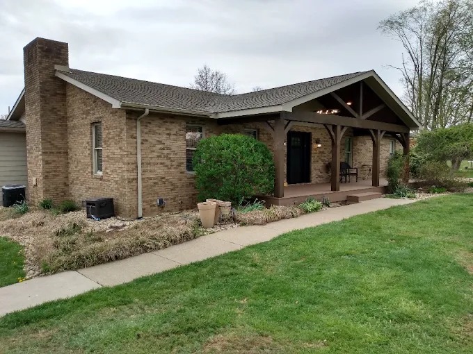 Timber frame builder at Sunrise Builders 4 LLC handcrafted porch work in Grainger County, TN