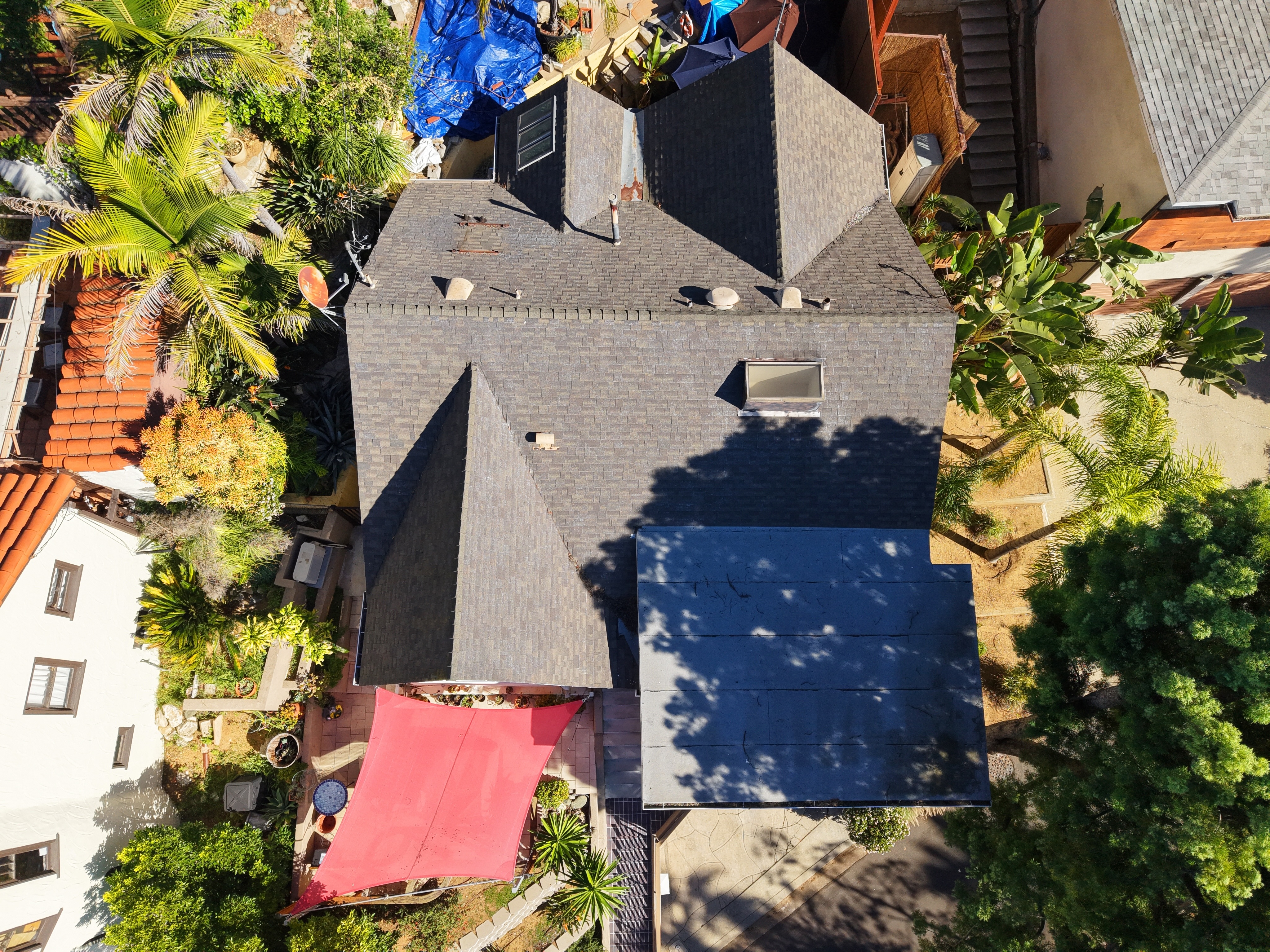 Before roof replacement: aerial drone view of original aged roofing at a Los Angeles residence by UV Roofing