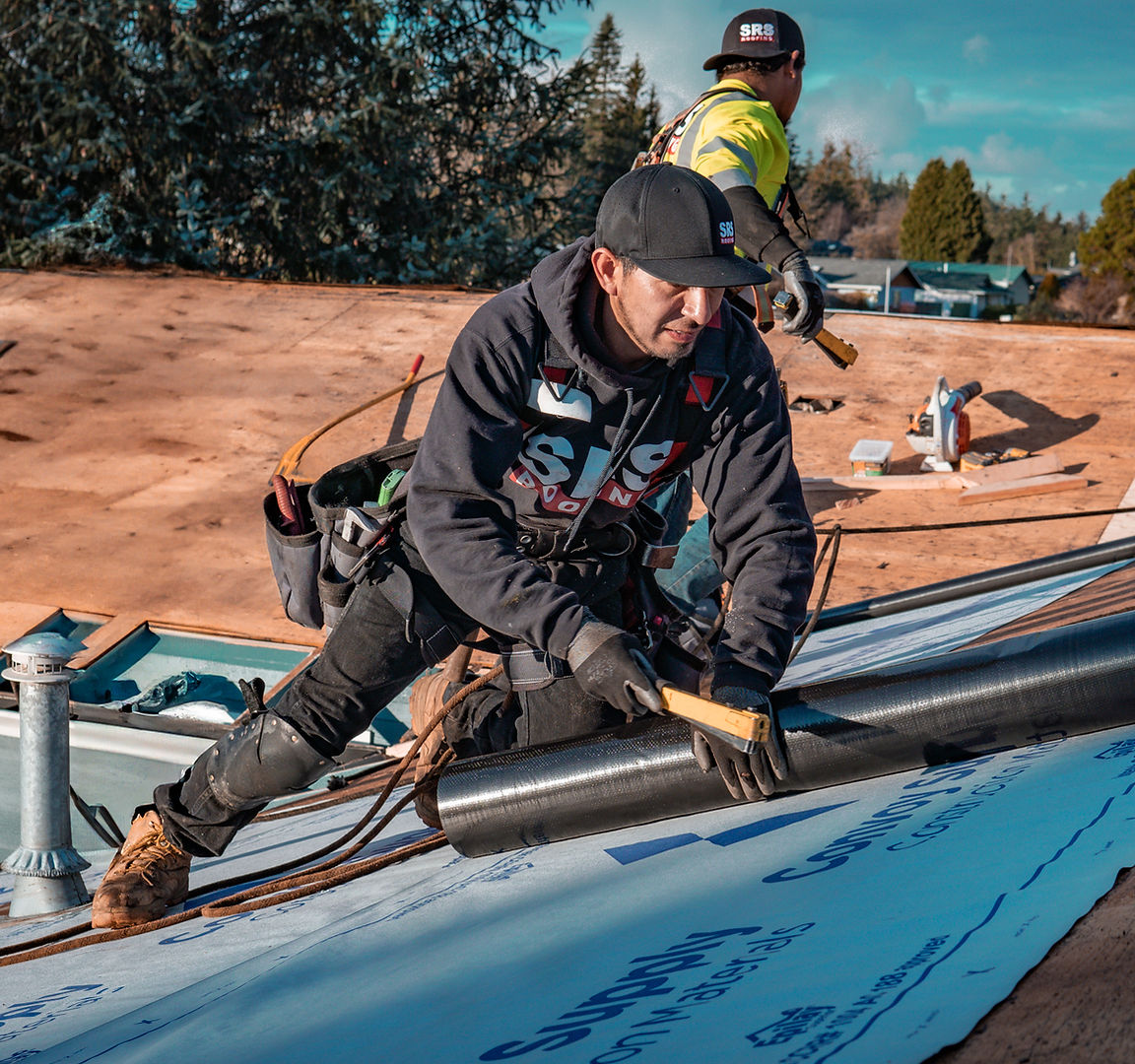 SRS Roofing crew installing a new roof