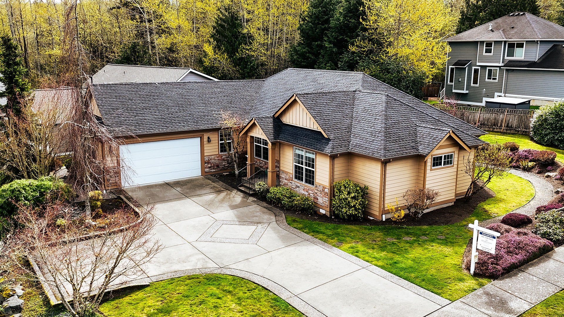 Aerial view of a completed roofing project