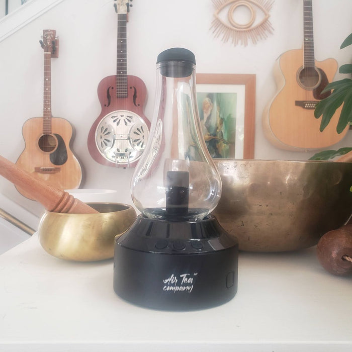 The Air Tea Kettle with a singing bowl and guitars.