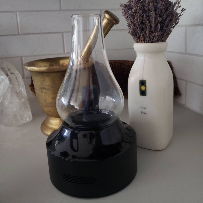 The Air Tea Kettle with a mortar and pestle and lavender.