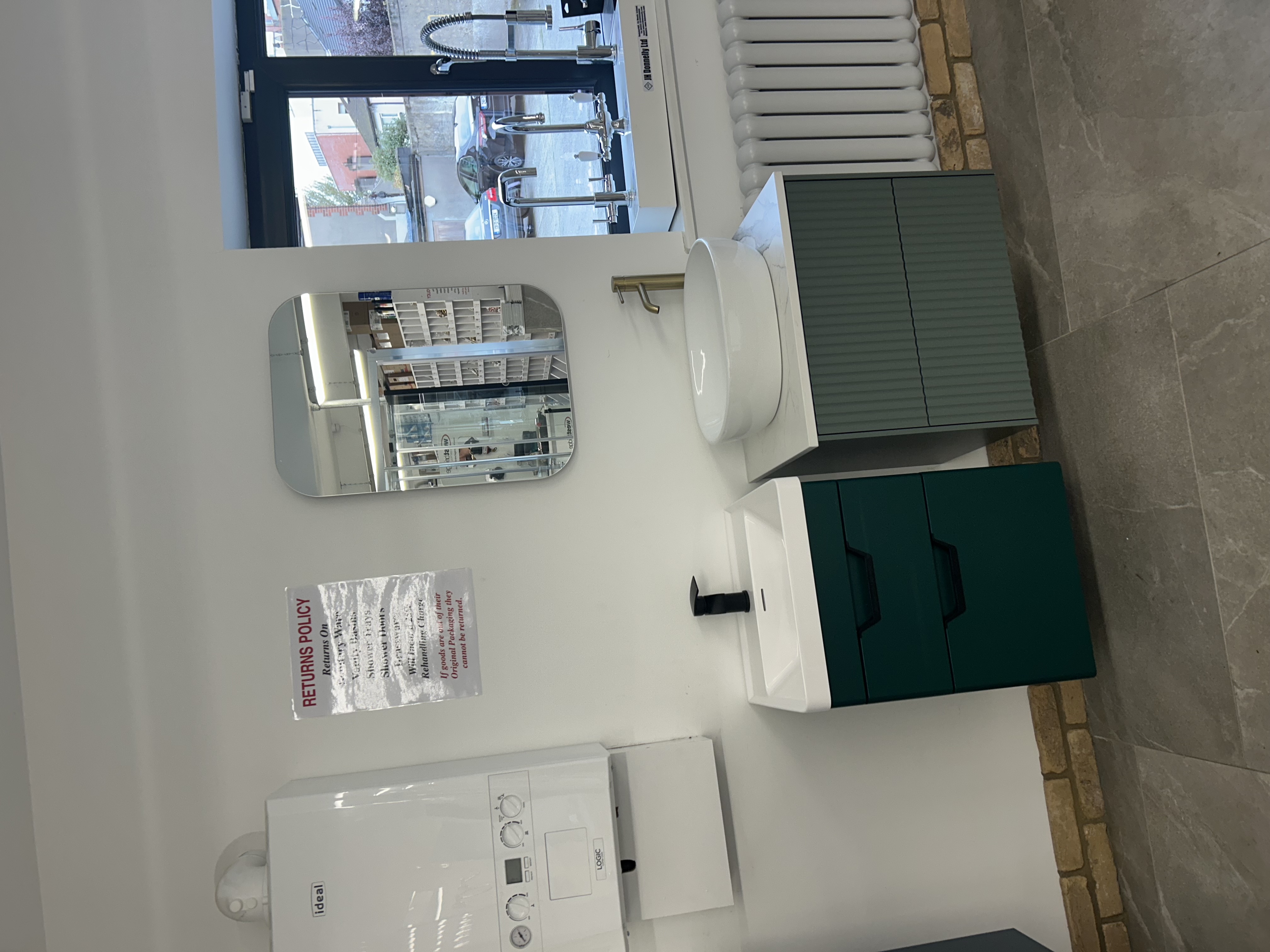 Botanic Supplies showroom vanity basins, taps and Ideal Logic boiler display