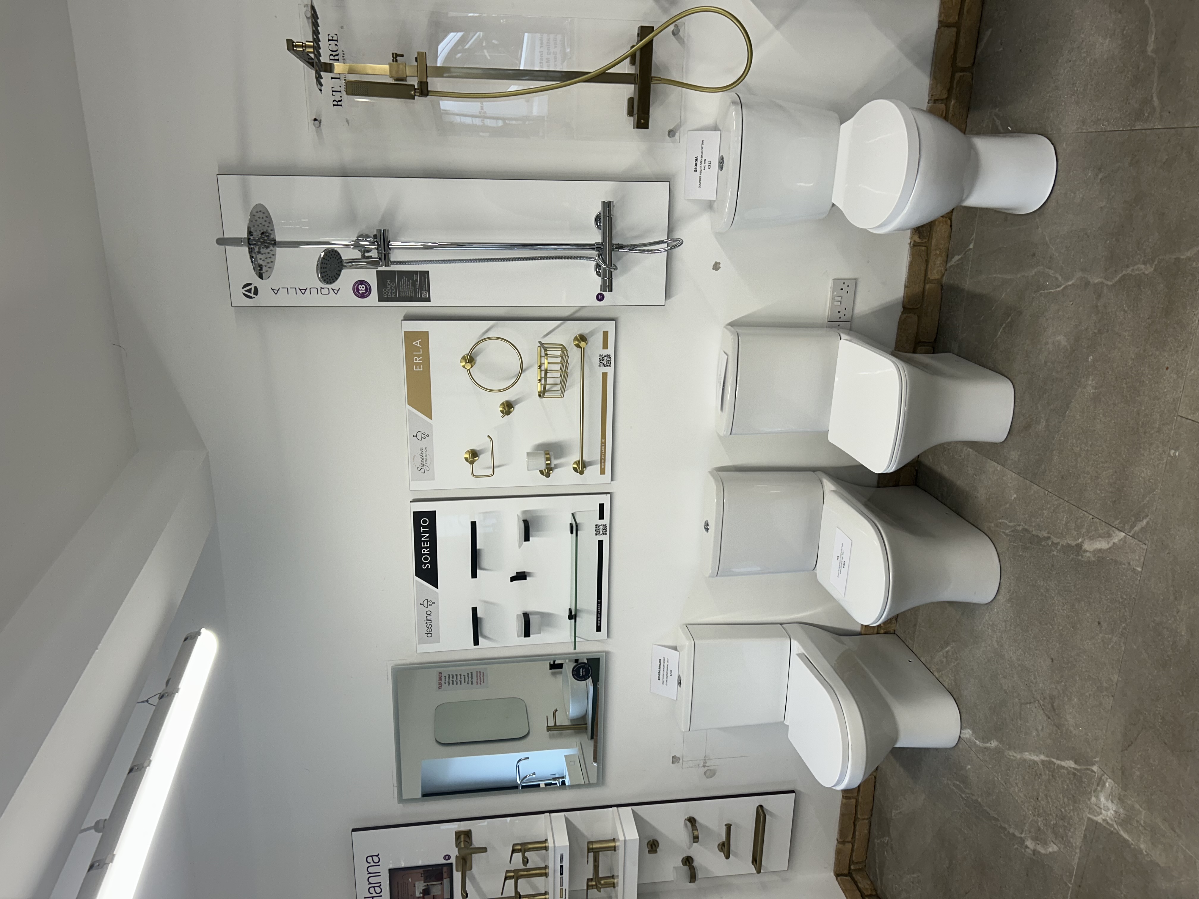 Botanic Supplies showroom bathroom display with sanitaryware, Aqualla brassware and showers
